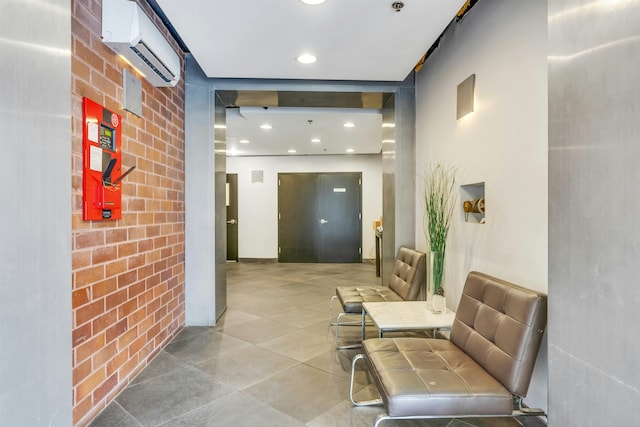 601 Observer Hwy Unit 204, Hoboken, NJ 07030 - hallway featuring a wall unit AC, tile patterned floors, and recessed lighting