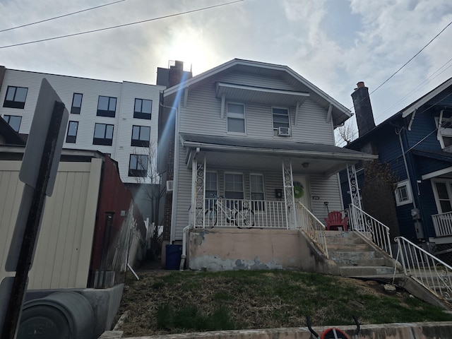 4524 Smith Ave, North Bergen, NJ 07047 - view of front facade with a porch and cooling unit