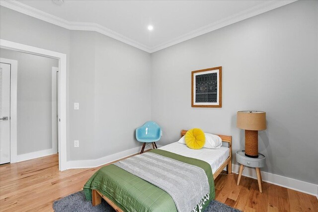 181 Bartholdi Ave Unit 2, Jersey City, NJ 07305 - bedroom featuring crown molding, wood finished floors, baseboards, and recessed lighting