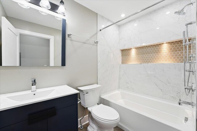 181 Bartholdi Ave Unit 2, Jersey City, NJ 07305 - bathroom featuring vanity, bathtub / shower combination, and toilet