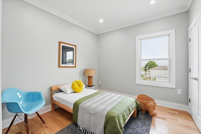 181 Bartholdi Ave Unit 2, Jersey City, NJ 07305 - bedroom featuring crown molding, wood finished floors, baseboards, and recessed lighting