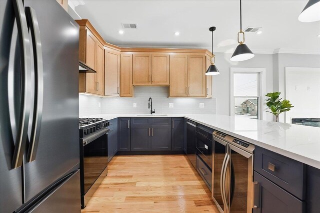 181 Bartholdi Ave Unit 2, Jersey City, NJ 07305 - kitchen featuring freestanding refrigerator, range with gas cooktop, wine cooler, a sink, and light wood-type flooring