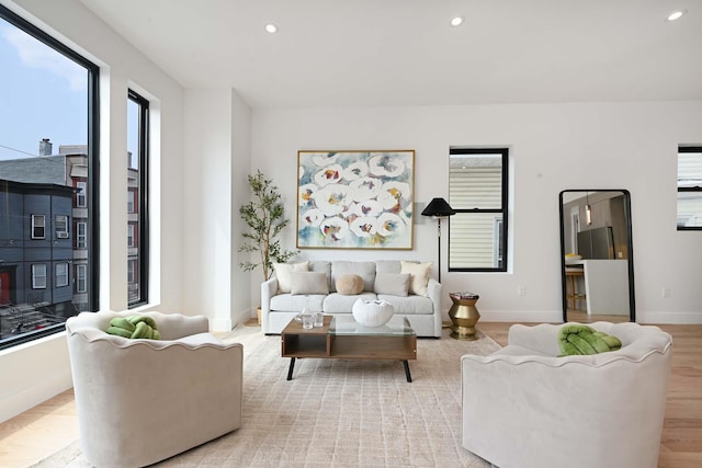 262 Webster Ave Unit 2, Jersey City, NJ 07307 - living room with recessed lighting and light wood-style floors