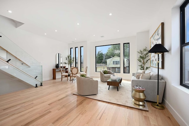 262 Webster Ave Unit 2, Jersey City, NJ 07307 - living room featuring light wood-style floors, recessed lighting, and stairs