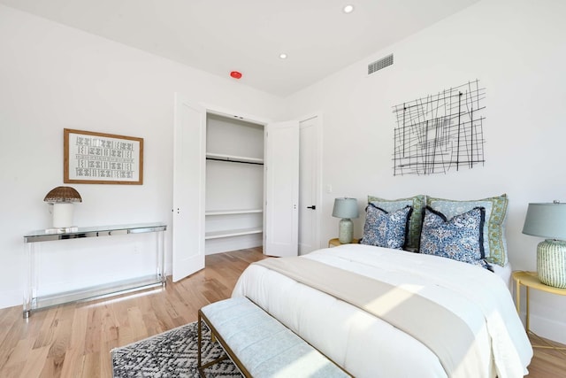 262 Webster Ave Unit 2, Jersey City, NJ 07307 - bedroom with light wood-style floors, a closet, and recessed lighting