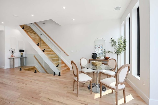 262 Webster Ave Unit 2, Jersey City, NJ 07307 - dining room with wood finished floors, stairs, and recessed lighting