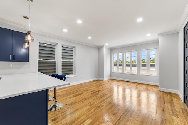 office featuring light wood-type flooring and crown molding