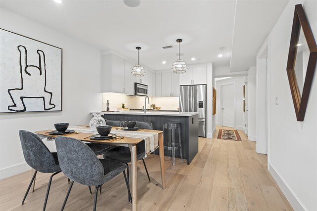 371 2nd St Unit 2B, Jersey City, NJ 07302 - dining room featuring light wood-type flooring and recessed lighting