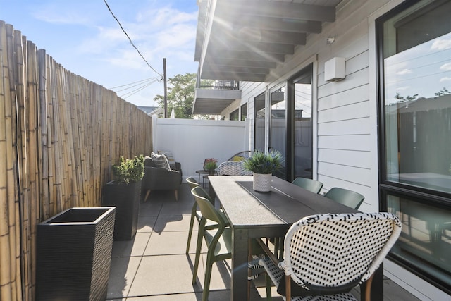 371 2nd St Unit 2B, Jersey City, NJ 07302 - fenced backyard with outdoor dining area and a patio