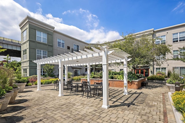 exterior space featuring a pergola