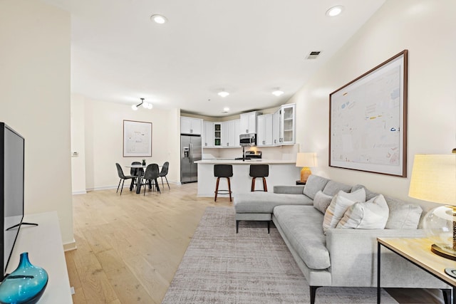 living room with light wood-type flooring