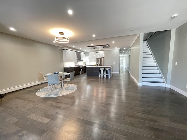 29 Carlton Ave Unit 2, Jersey City, NJ 07307 - dining area featuring dark wood-style flooring, stairway, baseboard heating, and recessed lighting