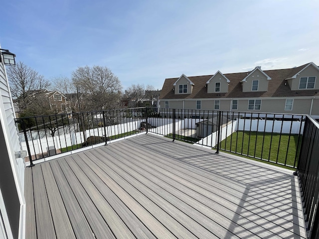 29 Carlton Ave Unit 2, Jersey City, NJ 07307 - wooden deck featuring a residential view and a lawn