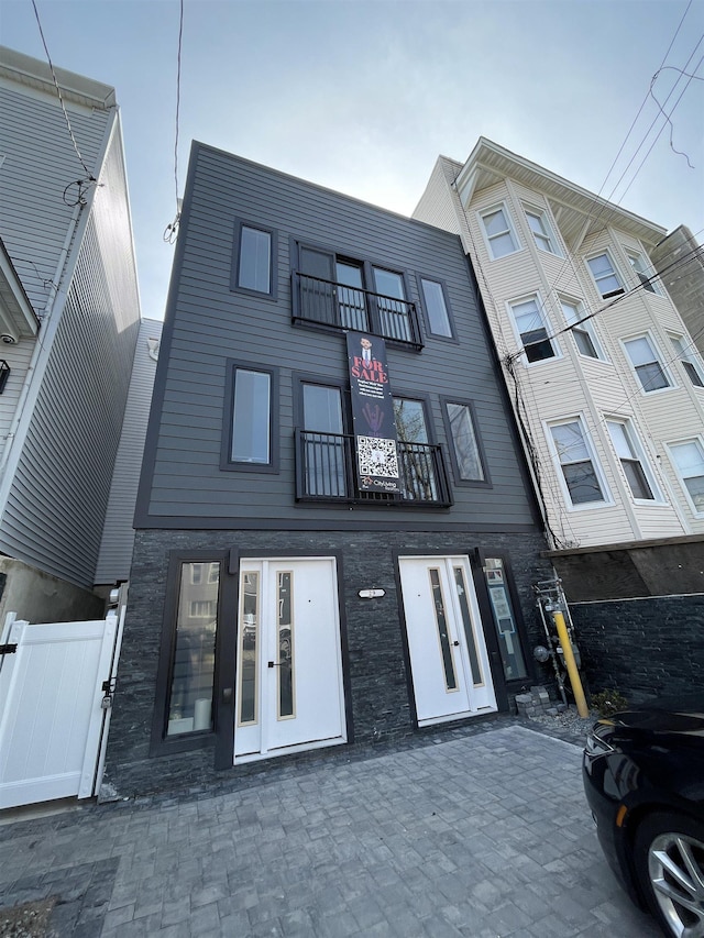 29 Carlton Ave Unit 2, Jersey City, NJ 07307 - rear view of property featuring stone siding