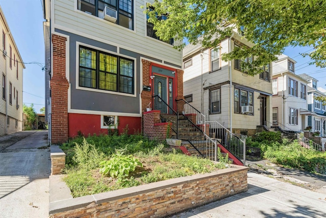 view of front of house with cooling unit