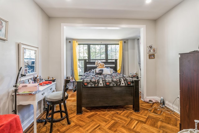 bedroom featuring parquet floors