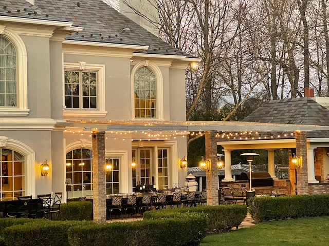 back of house with a patio area