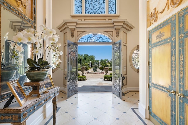 foyer entrance with a high ceiling