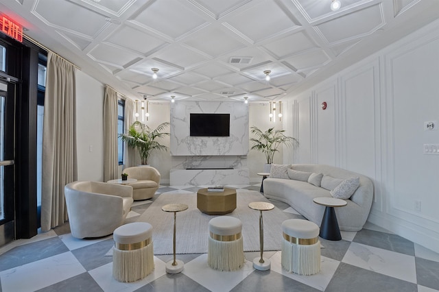 living room with coffered ceiling