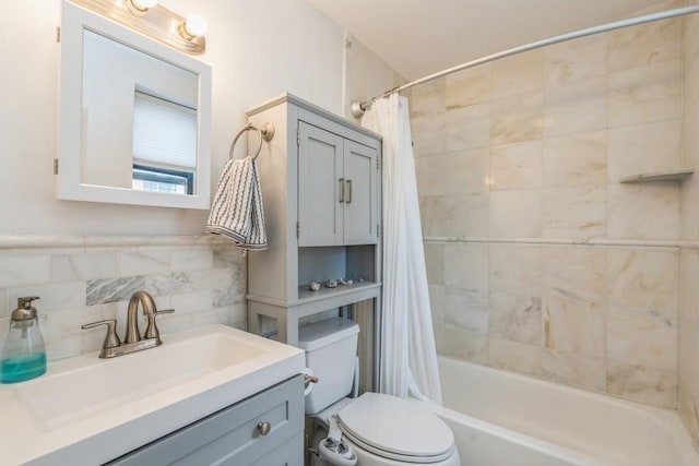 bathroom featuring toilet, vanity, and shower / bath combination with curtain