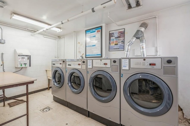 shared laundry area with washer and dryer