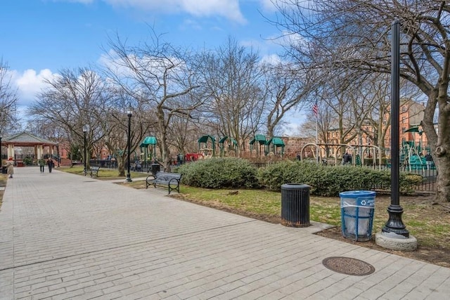 view of property's community with a gazebo and playground community