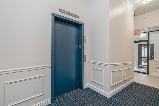 entrance to property featuring elevator