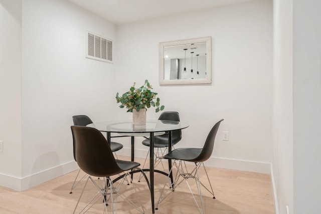 dining area featuring light hardwood / wood-style floors