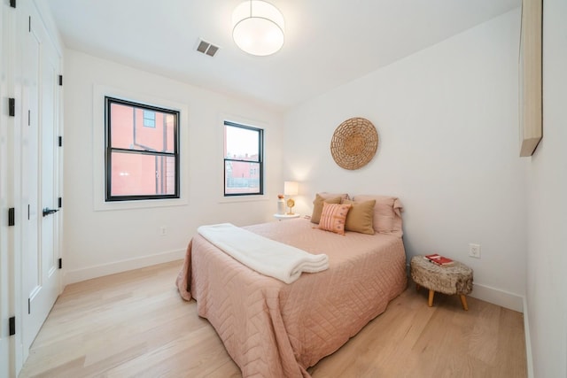 bedroom featuring light hardwood / wood-style floors