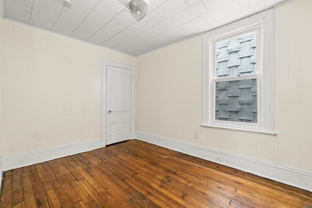 empty room featuring hardwood / wood-style flooring