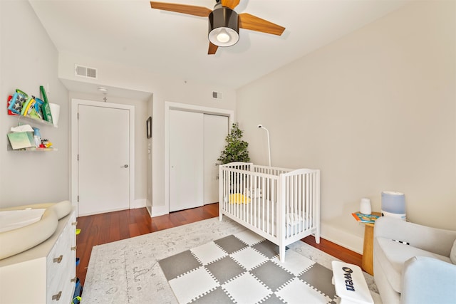 84 Willow Ave Unit 4B, Hoboken, NJ 07030 - bedroom with wood finished floors, a closet, ceiling fan, and a crib