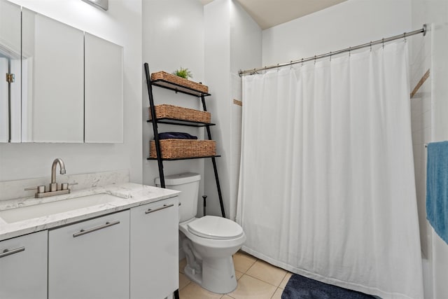 24 Ave At Port Imperial Unit 305, West New York, NJ 07093 - bathroom with curtained shower, vanity, tile patterned flooring, and toilet