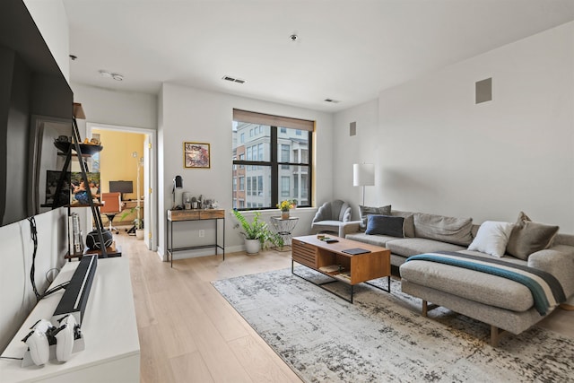 24 Ave At Port Imperial Unit 305, West New York, NJ 07093 - living area featuring visible vents, light wood finished floors, and baseboards