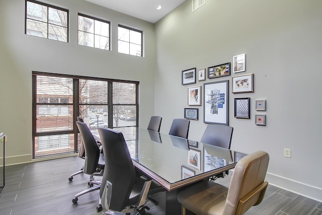 24 Ave At Port Imperial Unit 305, West New York, NJ 07093 - office space with wood finished floors, visible vents, a towering ceiling, and baseboards