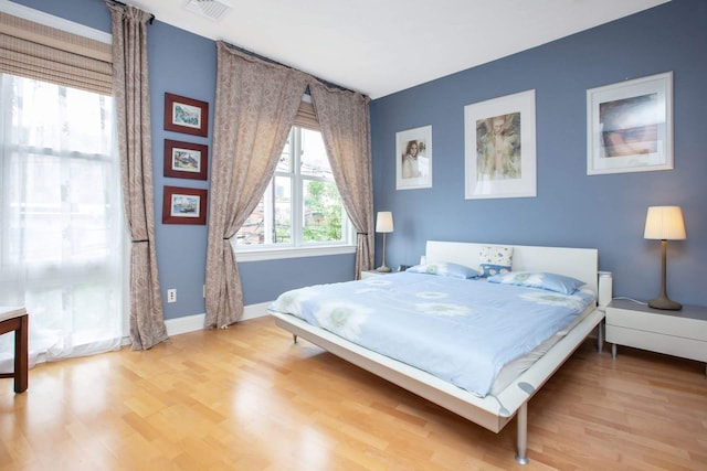 123 Tidewater St Unit B, Jersey City, NJ 07302 - bedroom with light wood-style flooring and baseboards