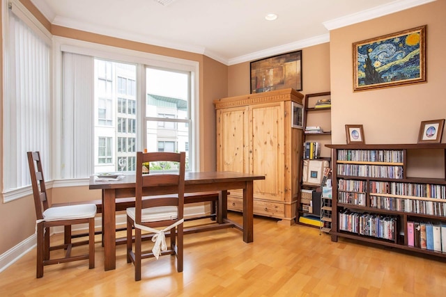 123 Tidewater St Unit B, Jersey City, NJ 07302 - dining room featuring light wood-type flooring and ornamental molding