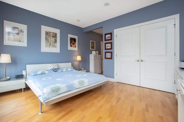 123 Tidewater St Unit B, Jersey City, NJ 07302 - bedroom with light wood-type flooring and a closet