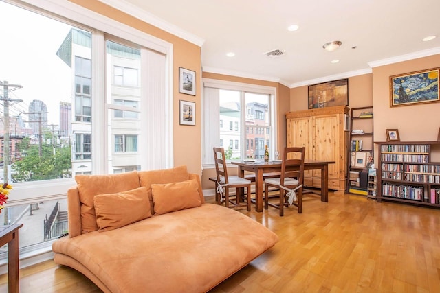 123 Tidewater St Unit B, Jersey City, NJ 07302 - sitting room with healthy amount of natural light, light wood-style floors, ornamental molding, and recessed lighting