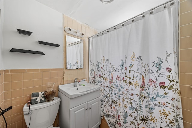 20 Martin Luther King Jr Dr, Jersey City, NJ 07305 - bathroom with tile walls, vanity, toilet, and a shower with shower curtain