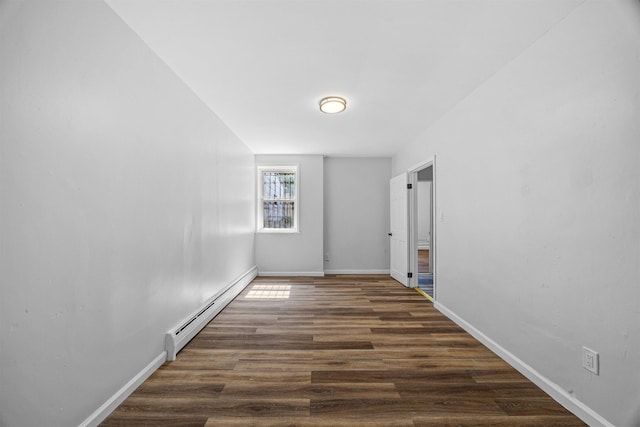 20 Martin Luther King Jr Dr, Jersey City, NJ 07305 - spare room with a baseboard heating unit, baseboards, and dark wood-style floors