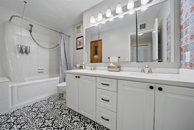 bathroom with double vanity, shower / bath combination with curtain, visible vents, toilet, and a sink