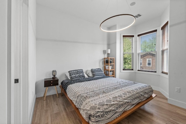 35 Manhattan Ave Unit 4, Jersey City, NJ 07307 - bedroom with wood finished floors and baseboards