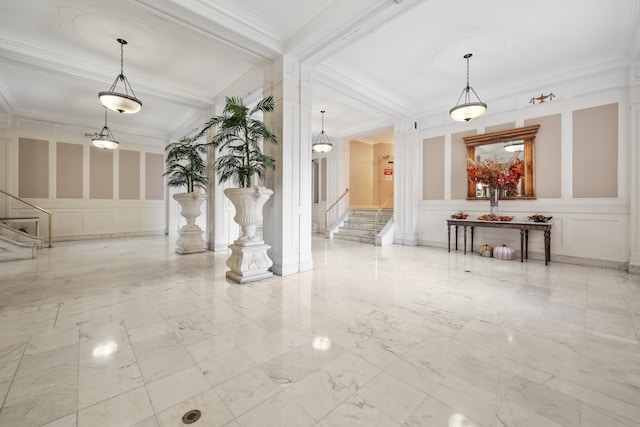 2600 Kennedy Blvd Unit 7L, Jersey City, NJ 07306 - living area with a decorative wall, stairway, crown molding, marble tiled floors, and coffered ceiling