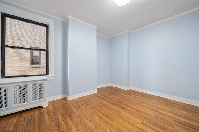 2600 Kennedy Blvd Unit 7L, Jersey City, NJ 07306 - empty room featuring baseboards, wood finished floors, and crown molding