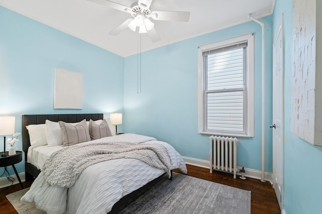388 Kennedy Blvd, Bayonne, NJ 07002 - bedroom featuring radiator, wood finished floors, and a ceiling fan