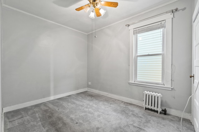 388 Kennedy Blvd, Bayonne, NJ 07002 - spare room with radiator heating unit, crown molding, carpet floors, ceiling fan, and healthy amount of natural light