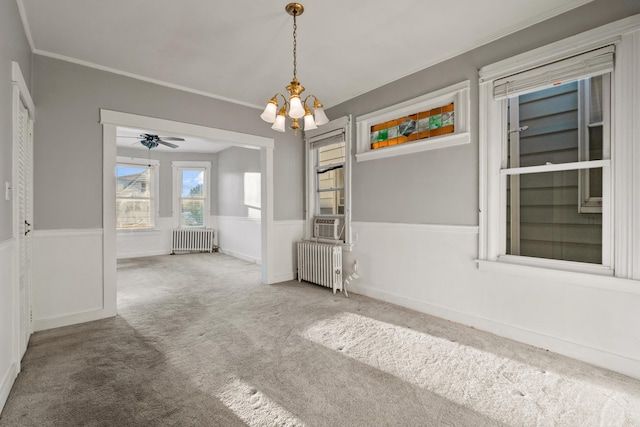388 Kennedy Blvd, Bayonne, NJ 07002 - unfurnished dining area with radiator, carpet, a chandelier, ornamental molding, and cooling unit