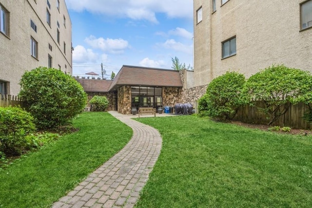 view of yard with a patio area and fence