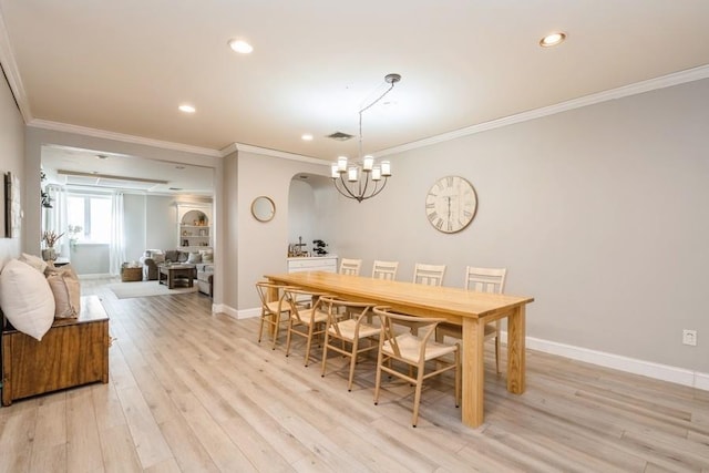 dining space featuring recessed lighting, baseboards, ornamental molding, and light wood finished floors