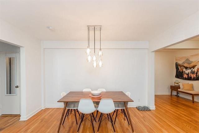 2520 Kennedy Blvd Unit 1H, Jersey City, NJ 07304 - dining room featuring light wood-type flooring and baseboards